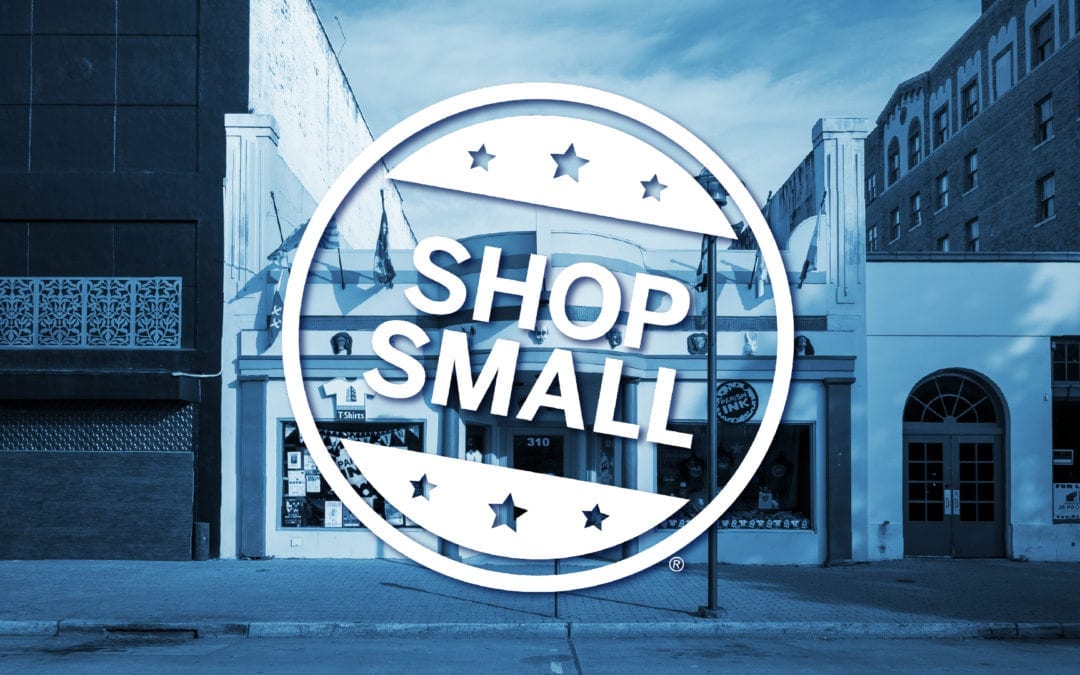 Shop Small logo over blue picture of storefront